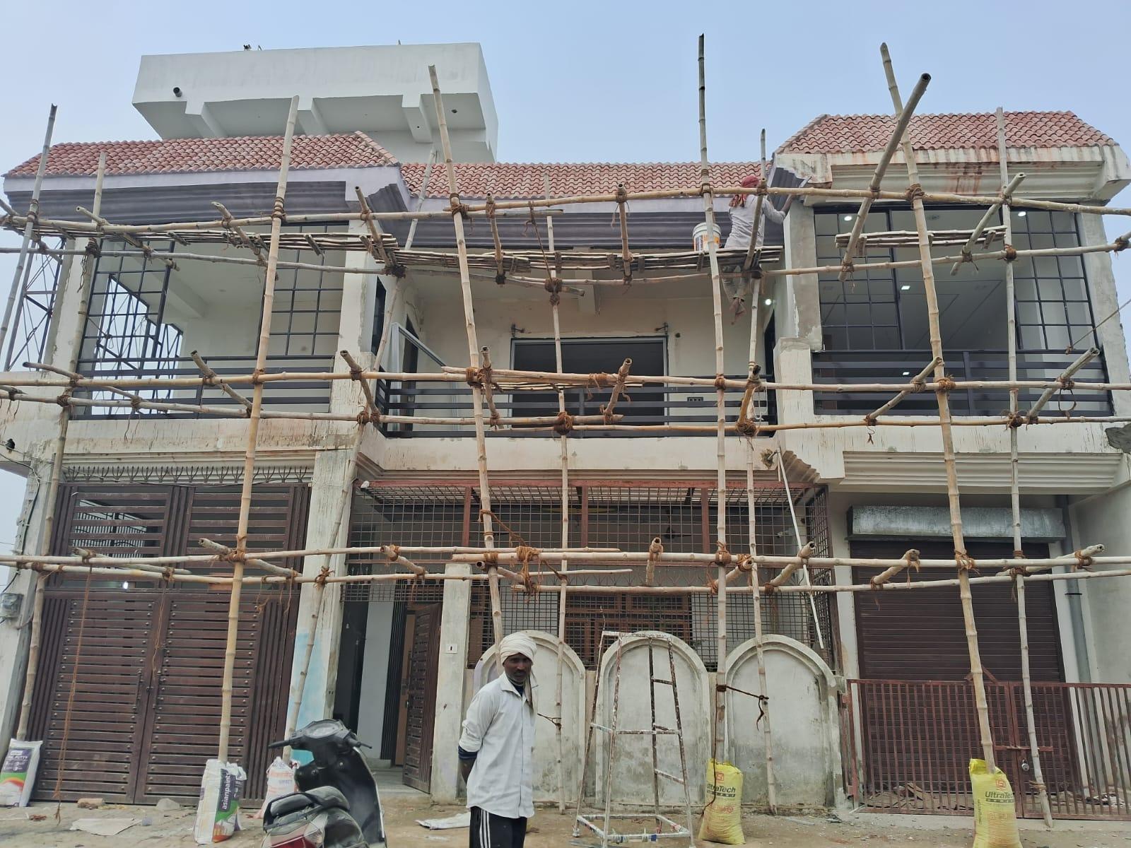 Dubey Mansion construction phase with scaffolding