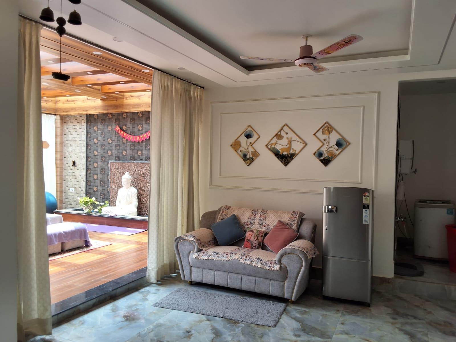 Living room with wall paneling and decor