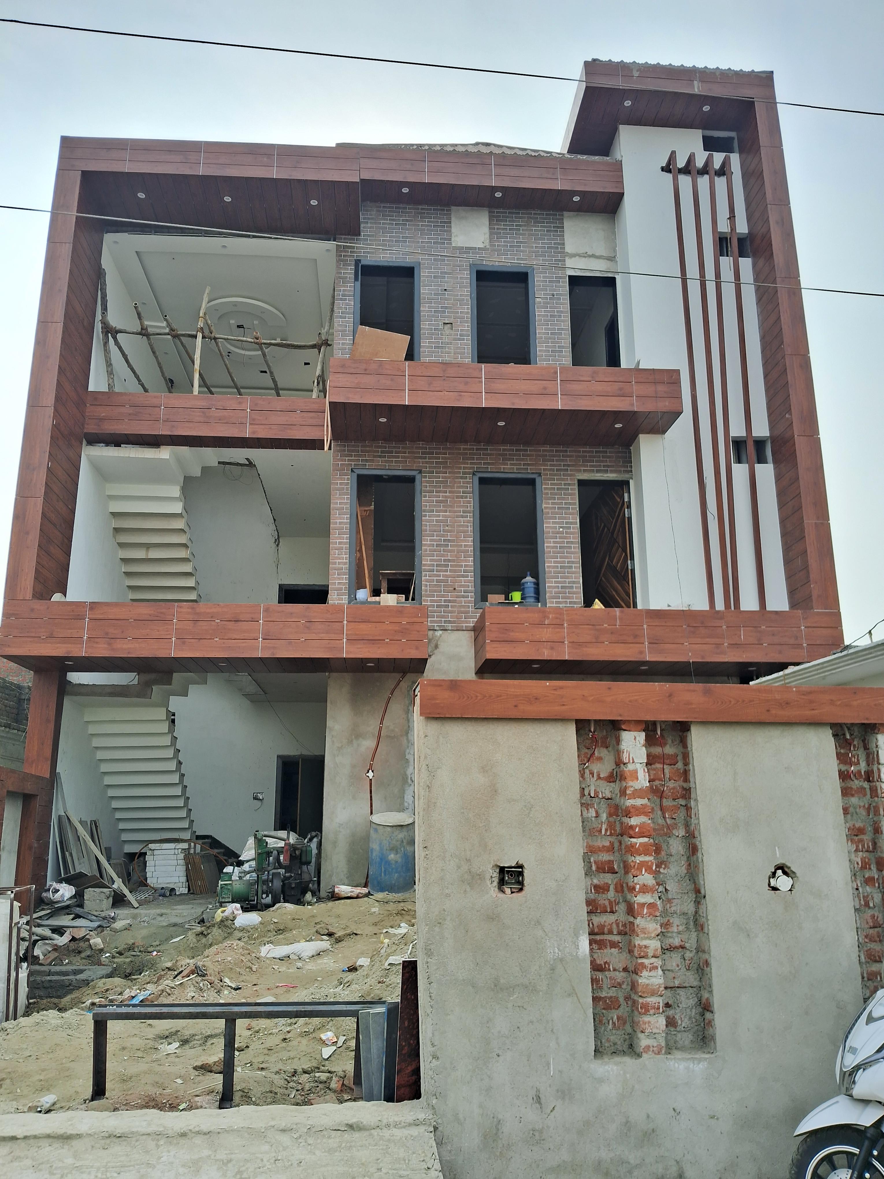 Classical heritage-style villa elevation with arched windows and stone columns